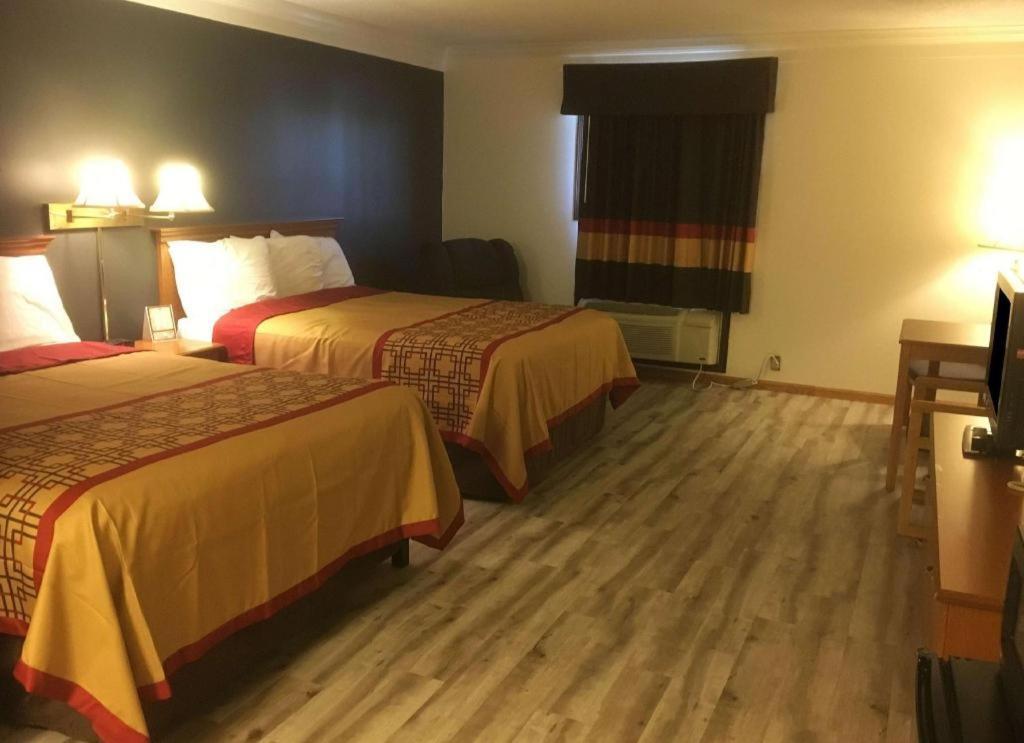 Americas Best Value Inn & Suites Тиф Ривър Фолс Екстериор снимка